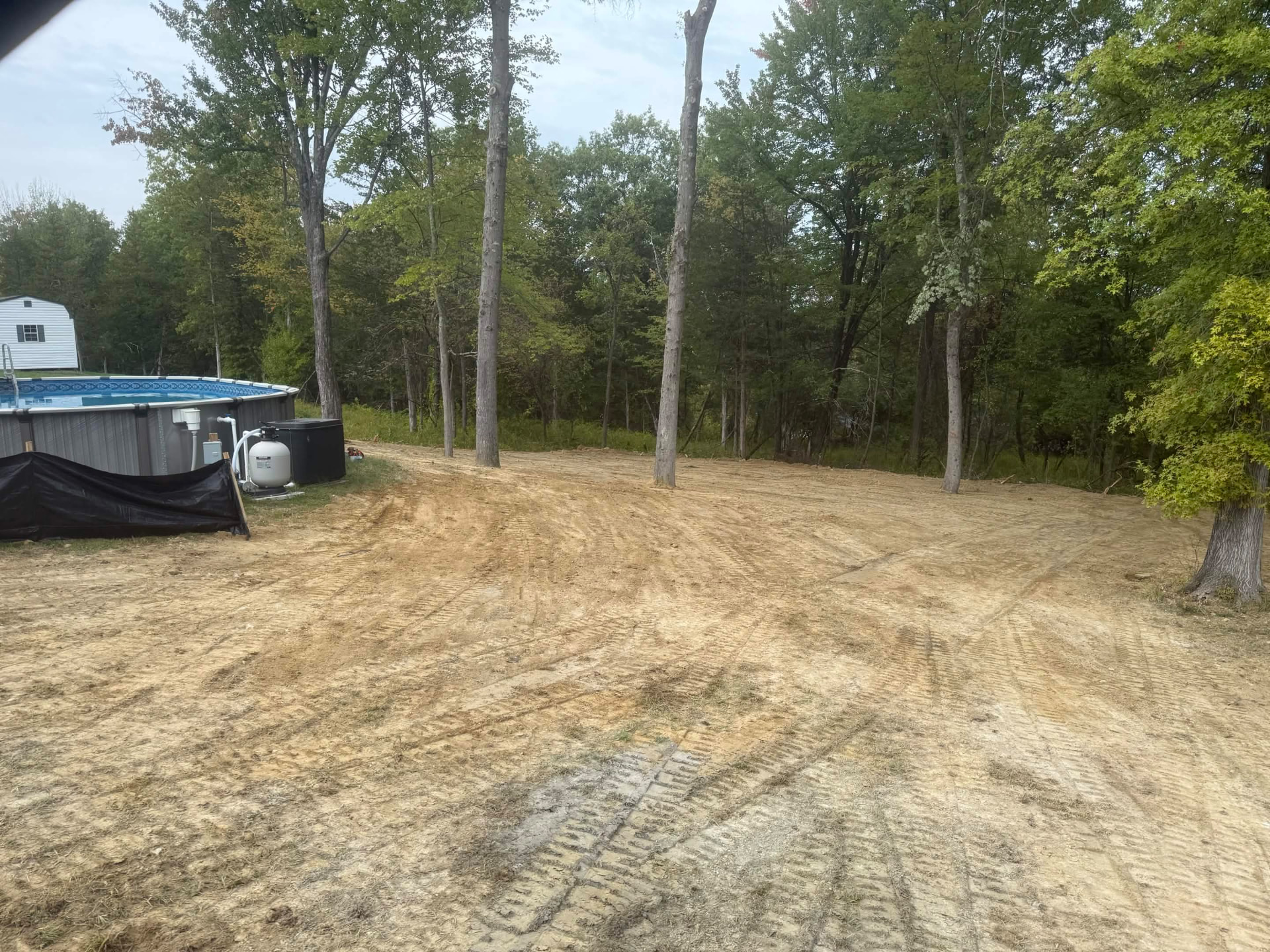 Finished grade around a pool area after excavation