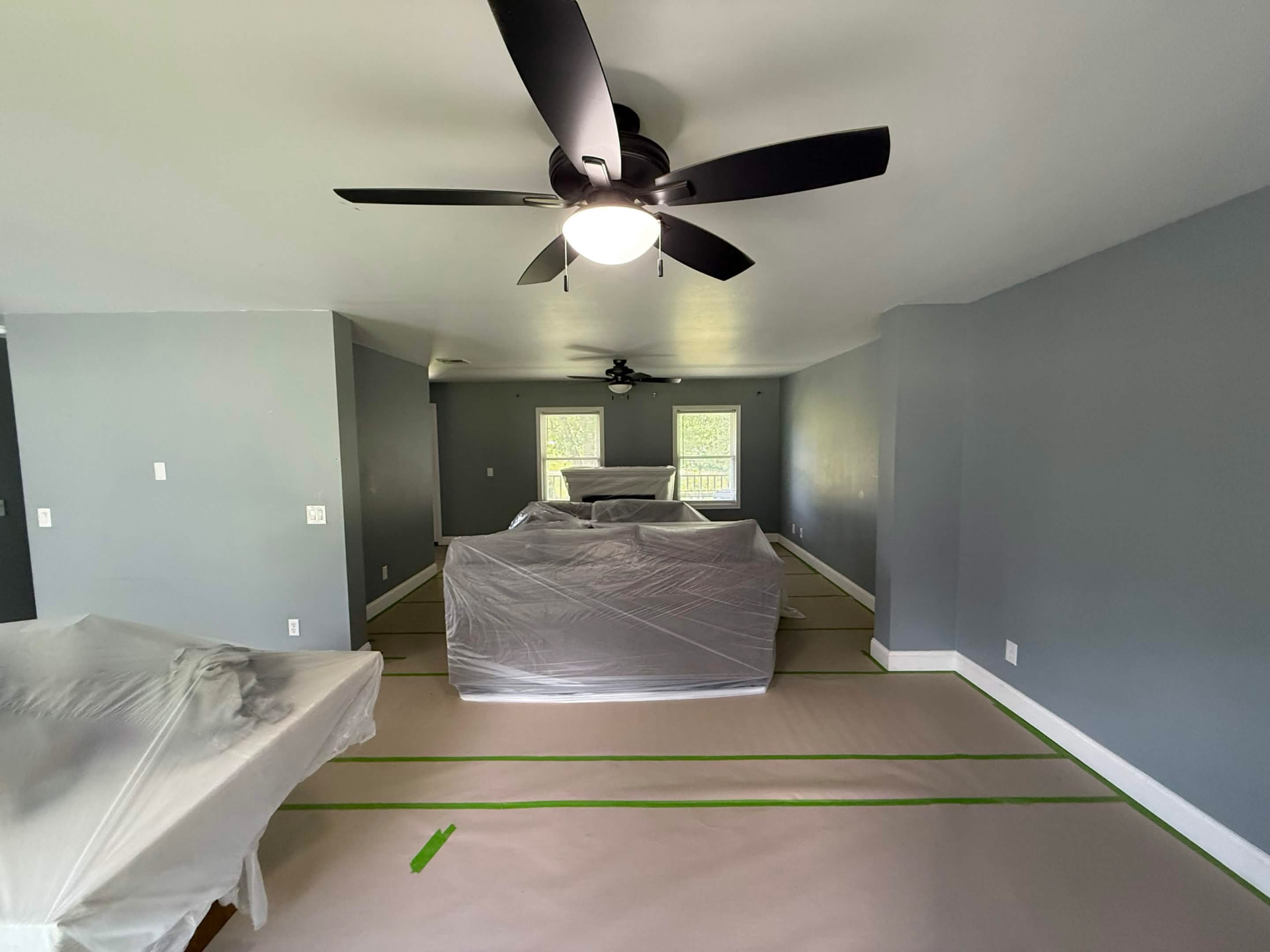 Painted bedroom with clean cut-in lines at the ceiling
